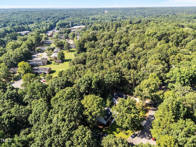 3309 Bearskin Ct, Raleigh, NC 27606 - aerial overview of property's location with a heavily wooded area