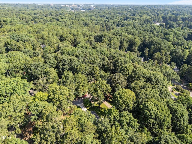 3309 Bearskin Ct, Raleigh, NC 27606 - aerial view of property and surrounding area with a heavily wooded area