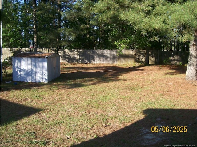 5212 Delco St, Fayetteville, NC 28311 - fenced backyard with a storage unit