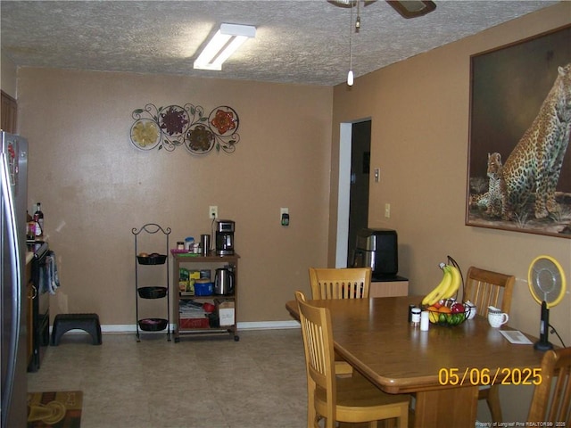 5212 Delco St, Fayetteville, NC 28311 - dining area featuring a textured ceiling, a ceiling fan, and tile patterned floors