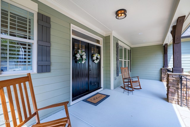 1013 Shasta Daisy Dr, Wake Forest, NC 27587 - entrance to property with a porch
