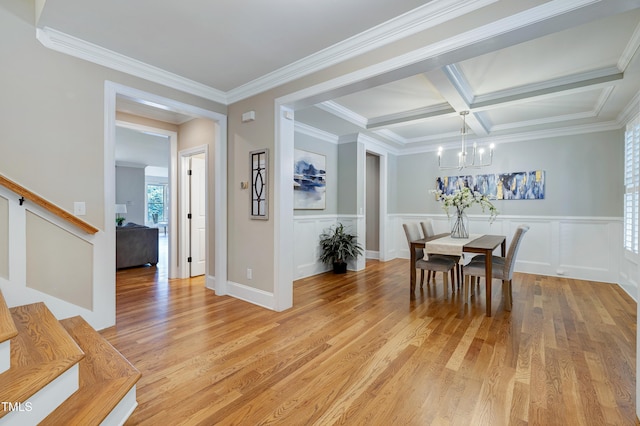 1013 Shasta Daisy Dr, Wake Forest, NC 27587 - dining area featuring a chandelier, light wood-type flooring, crown molding, coffered ceiling, and beamed ceiling