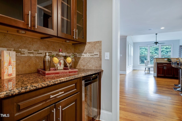 1013 Shasta Daisy Dr, Wake Forest, NC 27587 - bar featuring beverage cooler, light wood-style floors, backsplash, recessed lighting, and ceiling fan