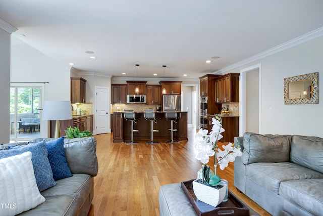 1013 Shasta Daisy Dr, Wake Forest, NC 27587 - living area featuring light wood-style flooring, recessed lighting, and ornamental molding