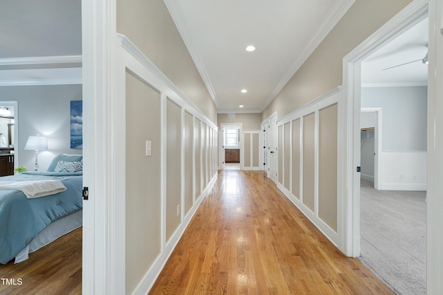 1013 Shasta Daisy Dr, Wake Forest, NC 27587 - corridor featuring light wood-type flooring, ornamental molding, and recessed lighting