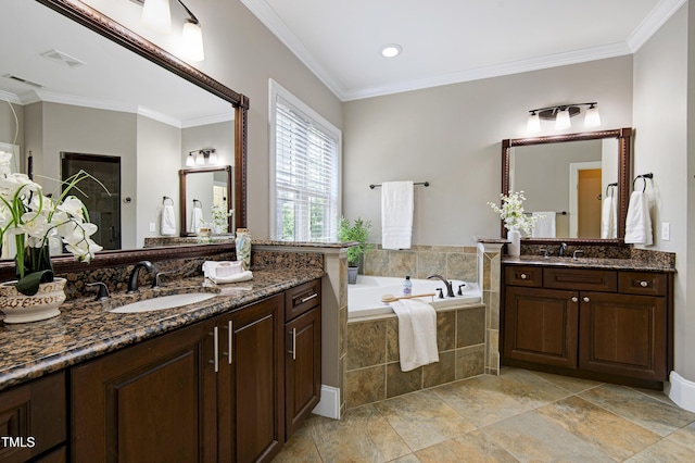 1013 Shasta Daisy Dr, Wake Forest, NC 27587 - bathroom with two vanities, a garden tub, crown molding, a stall shower, and recessed lighting