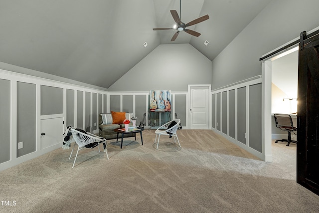 1013 Shasta Daisy Dr, Wake Forest, NC 27587 - sitting room with vaulted ceiling, ceiling fan, carpet, a barn door, and a desk
