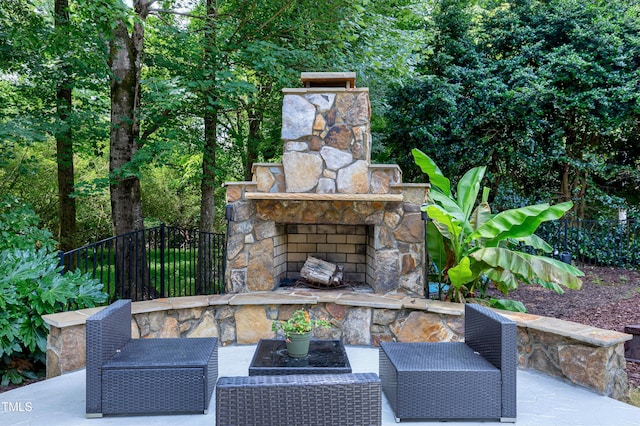 1013 Shasta Daisy Dr, Wake Forest, NC 27587 - view of patio / terrace with an outdoor stone fireplace
