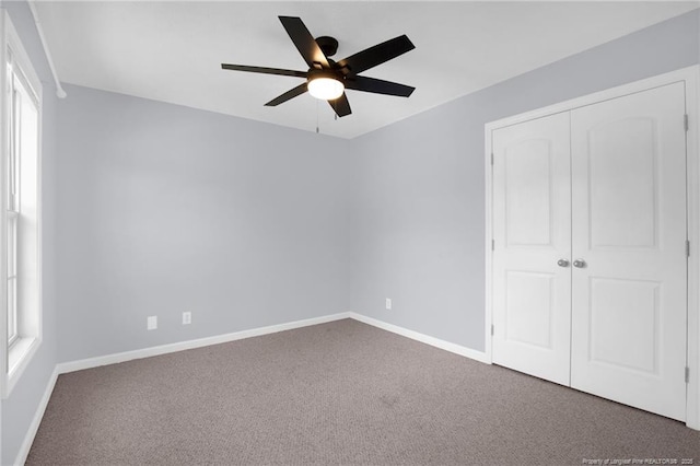 2505 Canford Ln, Fayetteville, NC 28304 - unfurnished bedroom with carpet floors, a closet, and a ceiling fan