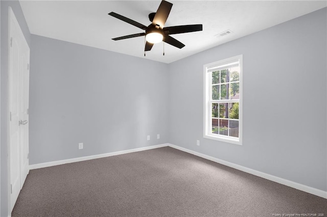 2505 Canford Ln, Fayetteville, NC 28304 - spare room featuring ceiling fan and dark carpet