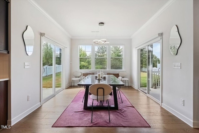 1848 Stagecoach Trl, Wendell, NC 27591 - dining space with crown molding and wood-type flooring