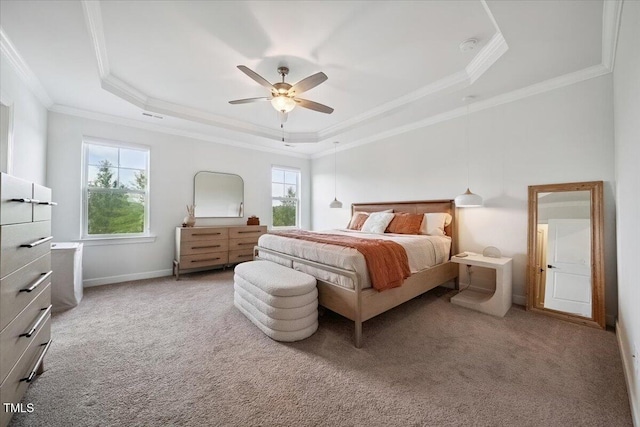 1848 Stagecoach Trl, Wendell, NC 27591 - bedroom with a tray ceiling, crown molding, carpet flooring, and a ceiling fan
