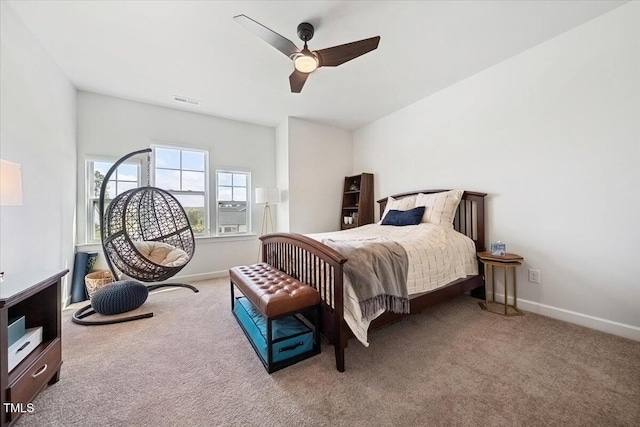1848 Stagecoach Trl, Wendell, NC 27591 - carpeted bedroom featuring a ceiling fan and baseboards