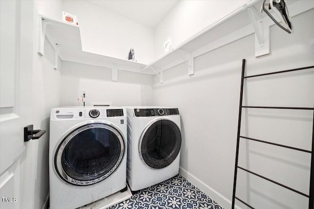1848 Stagecoach Trl, Wendell, NC 27591 - laundry area featuring separate washer and dryer and baseboards