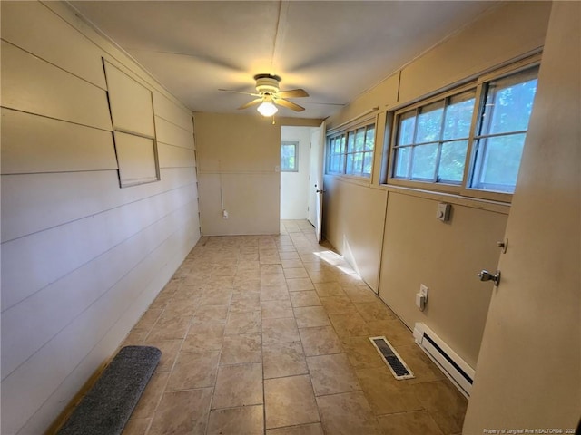 1227 E Martin Luther King Jr Dr, Maxton, NC 28364 - hallway featuring a baseboard heating unit