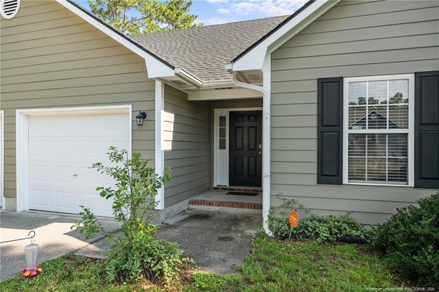 118 Bayou Ct, Raeford, NC 28376 - doorway to property featuring a garage and a shingled roof