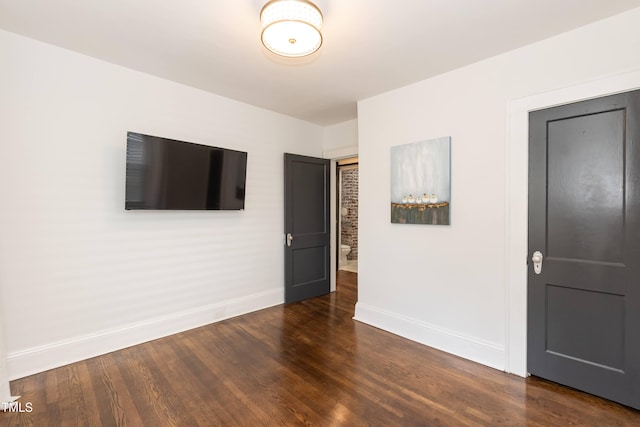415 W Carver St, Durham, NC 27704 - unfurnished room featuring dark wood-type flooring