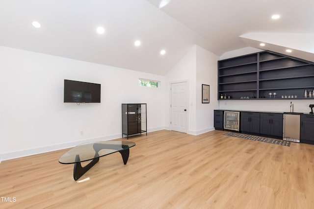 415 W Carver St, Durham, NC 27704 - indoor wet bar featuring recessed lighting, light wood-style floors, vaulted ceiling, beverage cooler, and built in features