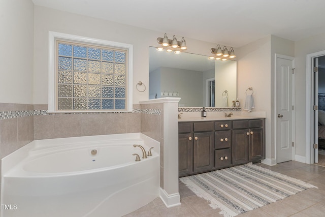 2407 Cattail Pond Dr, Zebulon, NC 27597 - full bathroom with tile patterned flooring, a bath, and double vanity