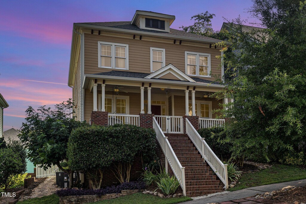 120 Hillspring Ln, Chapel Hill, NC 27516 - american foursquare style home featuring a porch, brick siding, and stairway