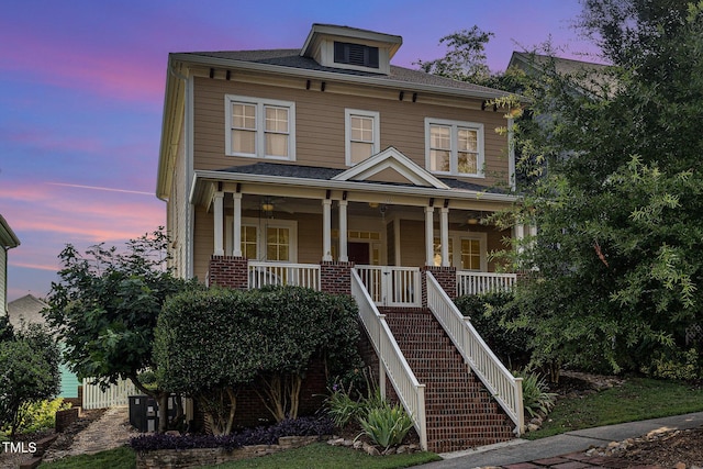120 Hillspring Ln, Chapel Hill, NC 27516 - american foursquare style home featuring a porch, brick siding, and stairway