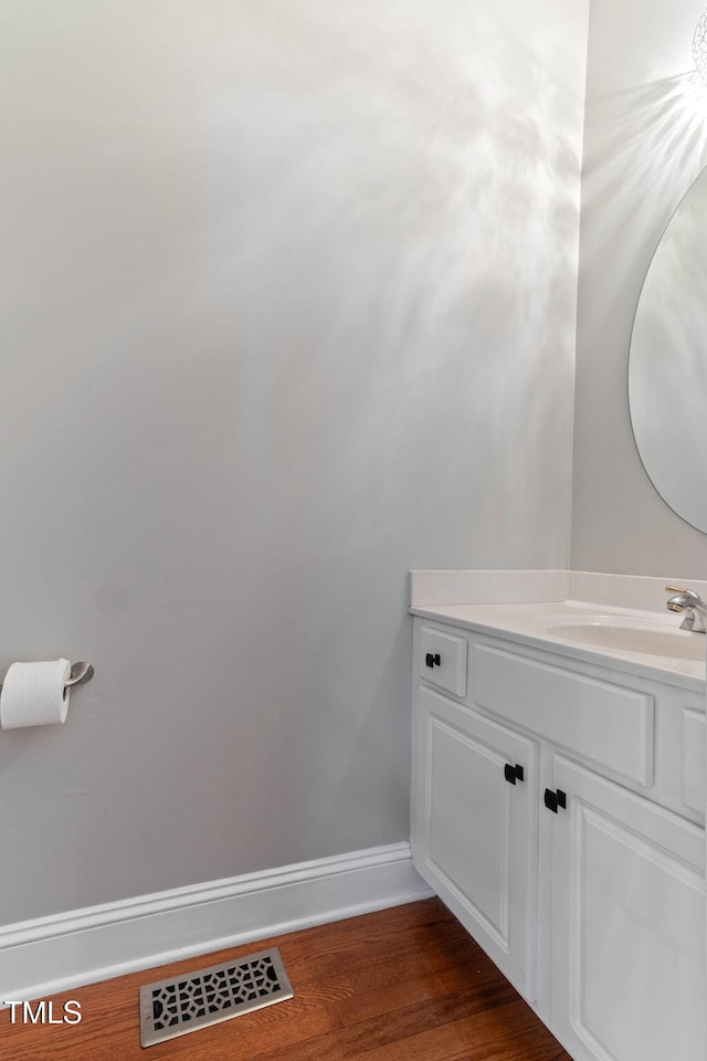 8508 Parlange Woods Ln, Wake Forest, NC 27587 - bathroom with wood finished floors and vanity
