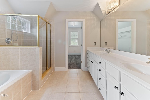 8508 Parlange Woods Ln, Wake Forest, NC 27587 - bathroom featuring a shower stall, double vanity, a bath, and tile patterned floors