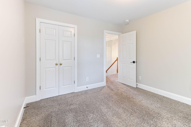 8508 Parlange Woods Ln, Wake Forest, NC 27587 - unfurnished bedroom with carpet and a closet