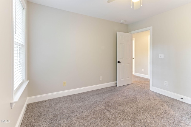 8508 Parlange Woods Ln, Wake Forest, NC 27587 - unfurnished room with carpet flooring, a ceiling fan, and a smoke detector