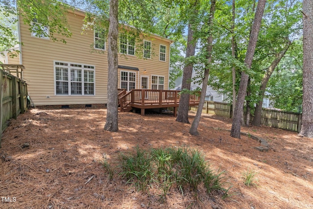 8508 Parlange Woods Ln, Wake Forest, NC 27587 - back of house featuring a deck, crawl space, and a fenced backyard