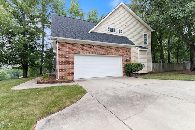 8508 Parlange Woods Ln, Wake Forest, NC 27587 - view of side of home featuring driveway, roof with shingles, brick siding, and a garage
