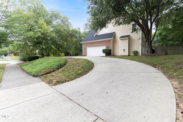 8508 Parlange Woods Ln, Wake Forest, NC 27587 - view of front facade featuring brick siding, driveway, and a garage
