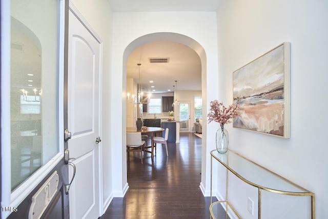 21 Intuition Cir, Durham, NC 27705 - entryway with arched walkways, dark wood-type flooring, and recessed lighting
