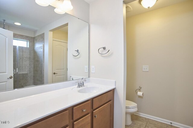 21 Intuition Cir, Durham, NC 27705 - full bathroom with vanity, tile patterned floors, and a tile shower