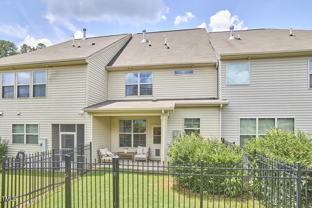 21 Intuition Cir, Durham, NC 27705 - rear view of property featuring an outdoor living space and a patio area