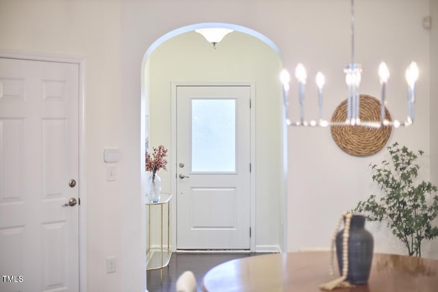 21 Intuition Cir, Durham, NC 27705 - entrance foyer featuring a chandelier and arched walkways