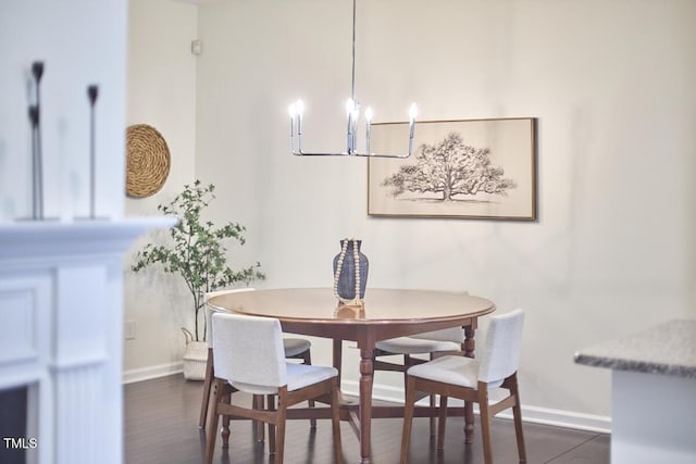 21 Intuition Cir, Durham, NC 27705 - dining room with a chandelier and dark wood-style floors