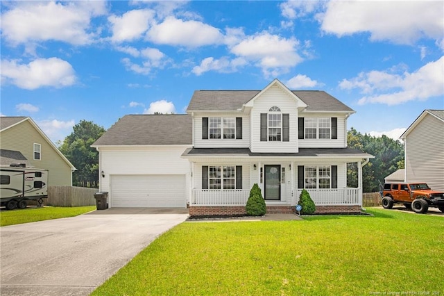 145 Edgecombe Dr, Spring Lake, NC 28390 - traditional-style home featuring a porch, a garage, and concrete driveway