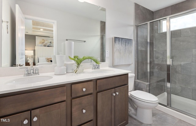 1516 Tamarisk Ln, Durham, NC 27703 - full bath featuring double vanity, a stall shower, and tile patterned floors