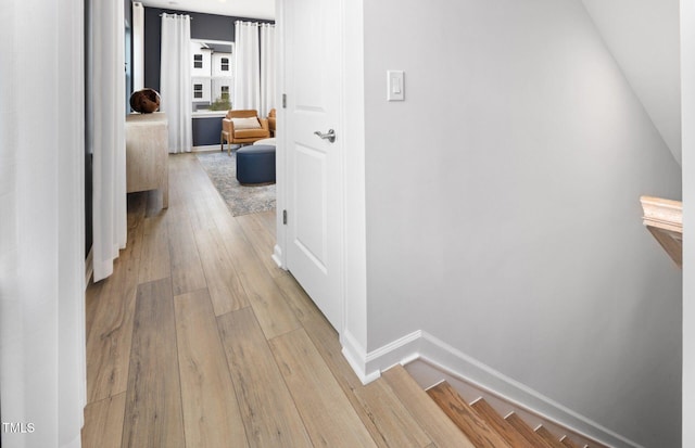 1516 Tamarisk Ln, Durham, NC 27703 - corridor with light wood-style floors and baseboards