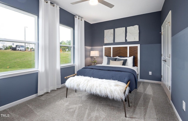 1516 Tamarisk Ln, Durham, NC 27703 - carpeted bedroom with baseboards and ceiling fan