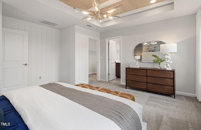1516 Tamarisk Ln, Durham, NC 27703 - bedroom featuring a tray ceiling, carpet flooring, a walk in closet, and ceiling fan