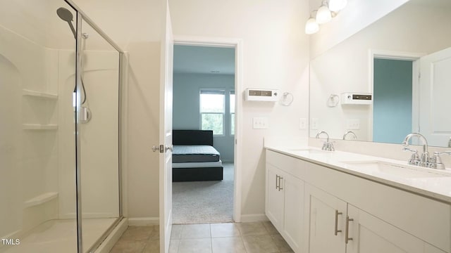103 Liam St Unit 108, Clayton, NC 27520 - bathroom with connected bathroom, double vanity, a shower stall, and tile patterned floors