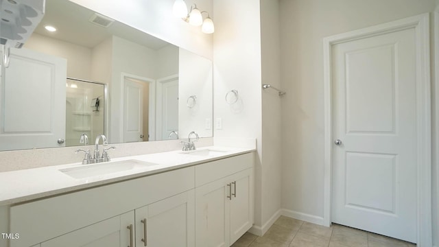 103 Liam St Unit 108, Clayton, NC 27520 - bathroom with double vanity, an enclosed shower, and tile patterned flooring