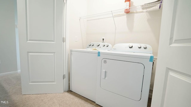 103 Liam St Unit 108, Clayton, NC 27520 - washroom featuring washer and clothes dryer and light colored carpet