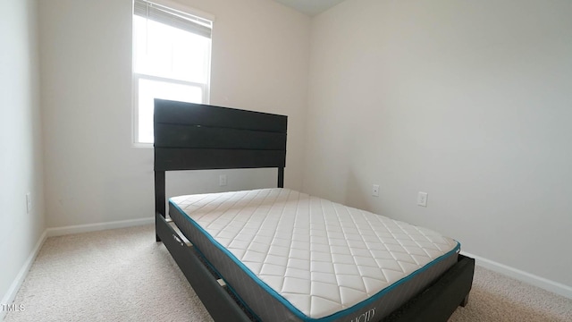 103 Liam St Unit 108, Clayton, NC 27520 - carpeted bedroom featuring baseboards