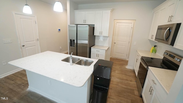 103 Liam St Unit 108, Clayton, NC 27520 - kitchen with appliances with stainless steel finishes, dark wood-type flooring, white cabinets, and decorative light fixtures
