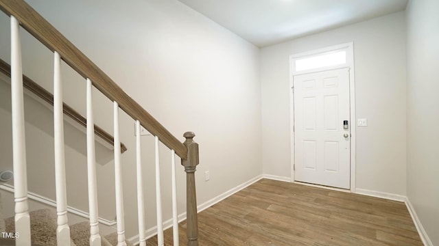 103 Liam St Unit 108, Clayton, NC 27520 - foyer entrance featuring wood finished floors and stairway