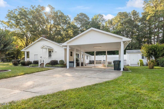 821 Northclift Dr, Raleigh, NC 27609 - view of front facade with driveway and a storage shed