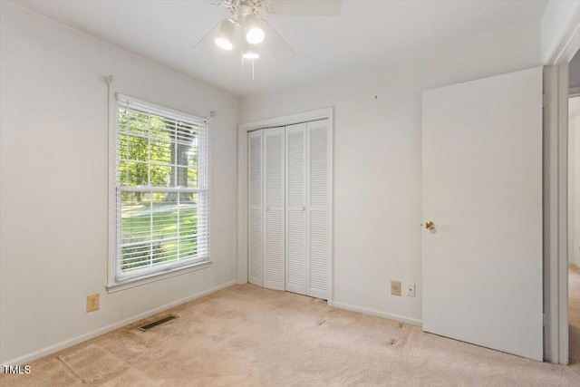 821 Northclift Dr, Raleigh, NC 27609 - unfurnished bedroom with carpet flooring, a closet, and ceiling fan
